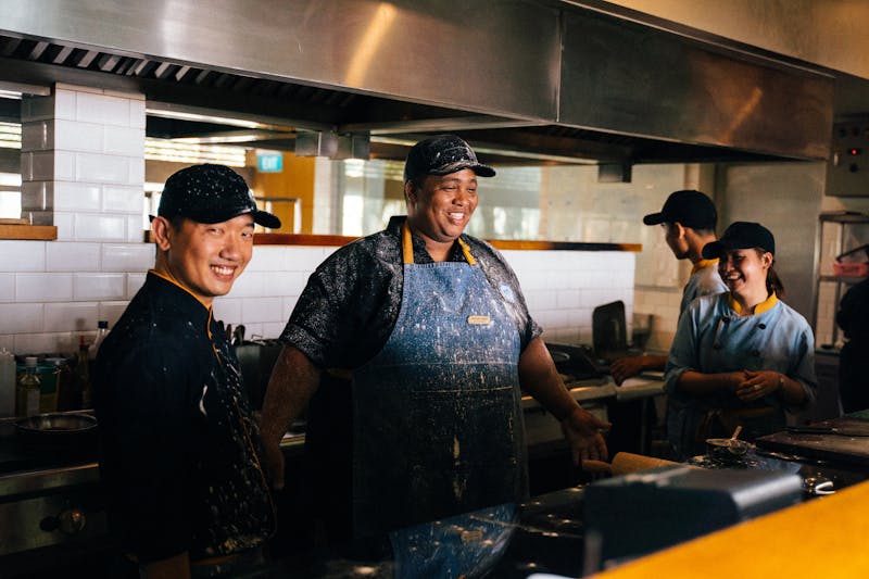 Dion's kitchen team preparing fresh ingredients