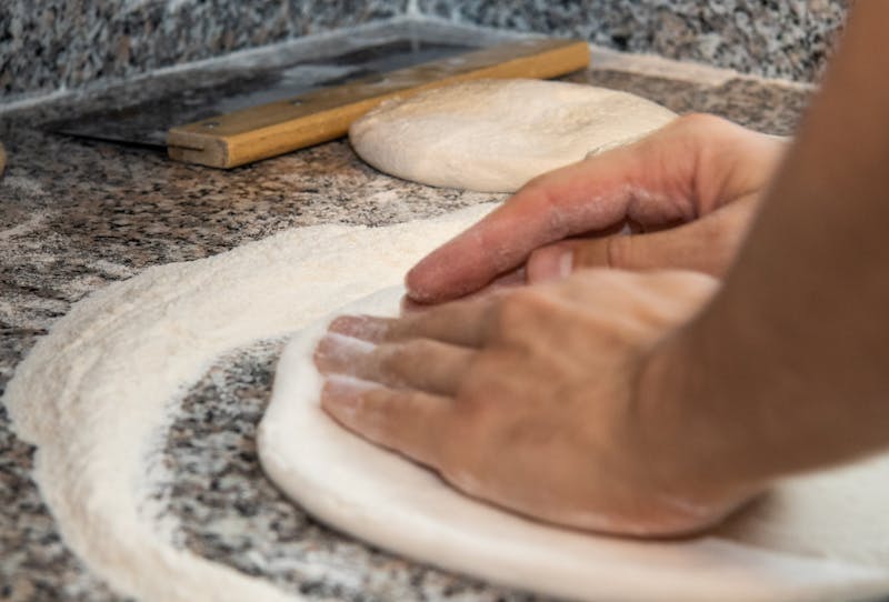 Expert Dion's chef carefully preparing a dish